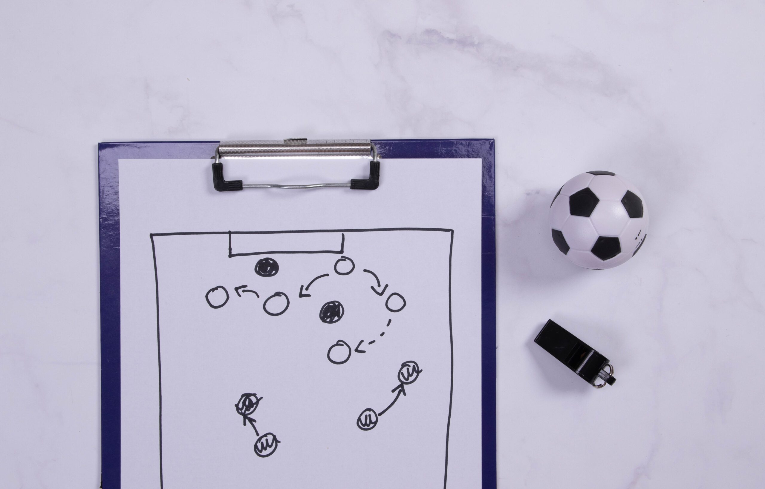 Clipboard with football strategy and tatics