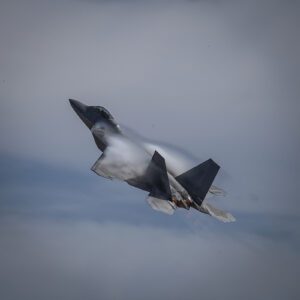 F22-Raptor accelerating up through the clouds as a metahof for strategic agility as an alternative to agile transformation.