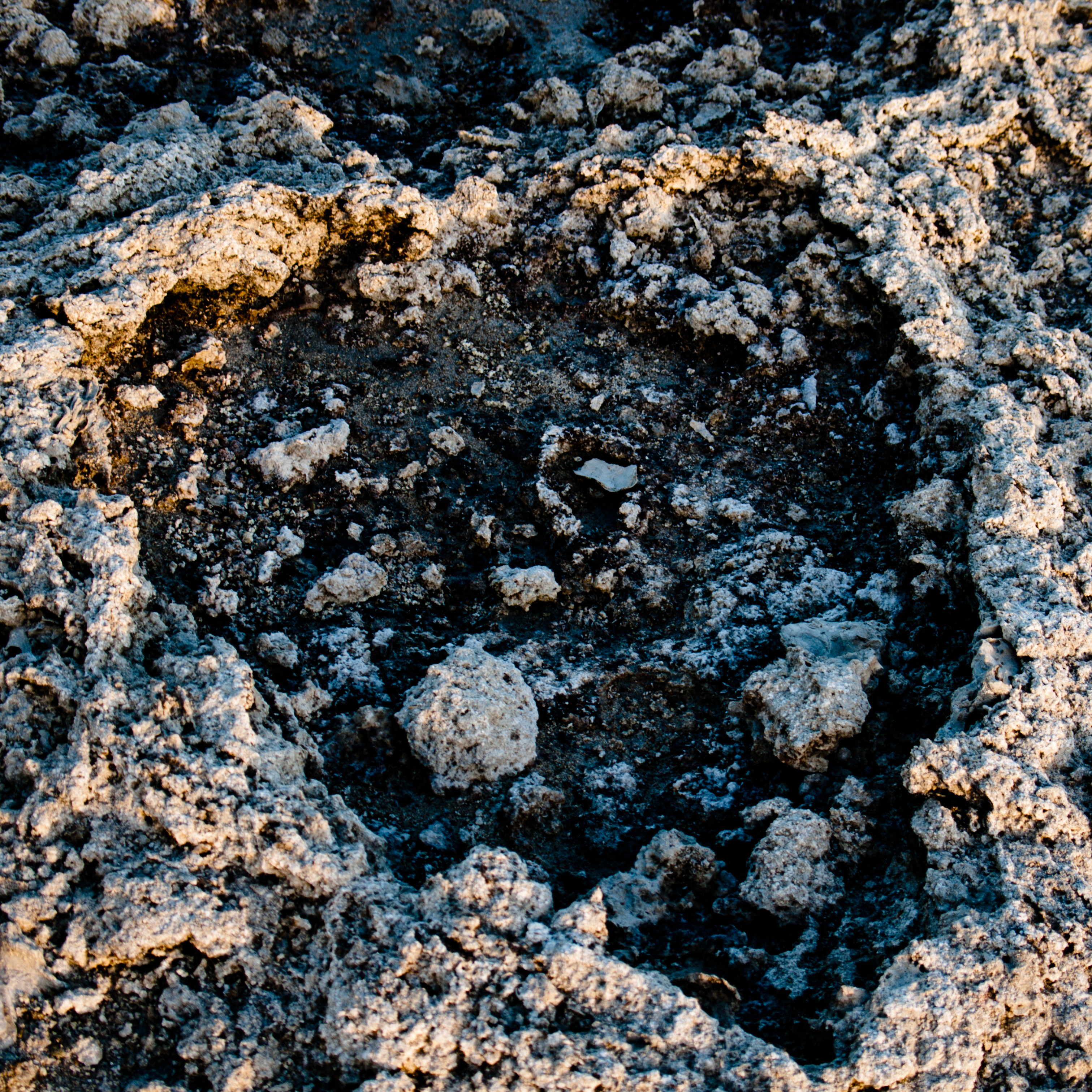 An indented heart shape in rock representing The Crux at the heart of Strategy Deployment