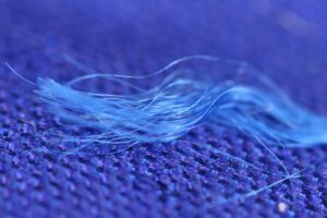 Entwined threads representing X-Matrix correlations.